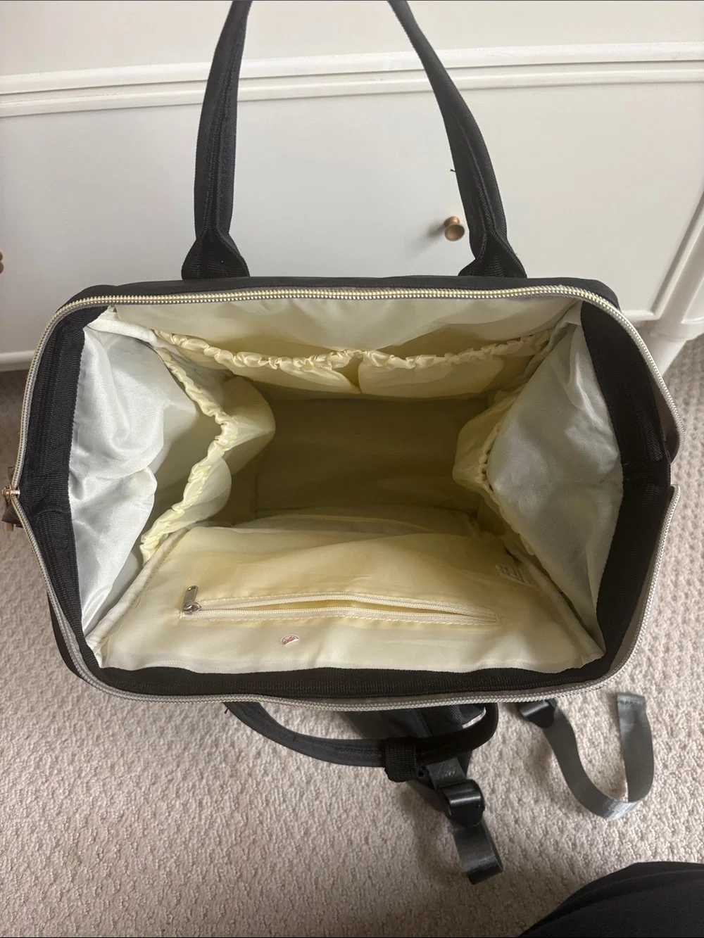 Amazon Black Baby Bag Backpack with Gold Accents